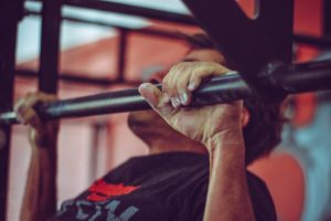 Closeup of man lifting weights